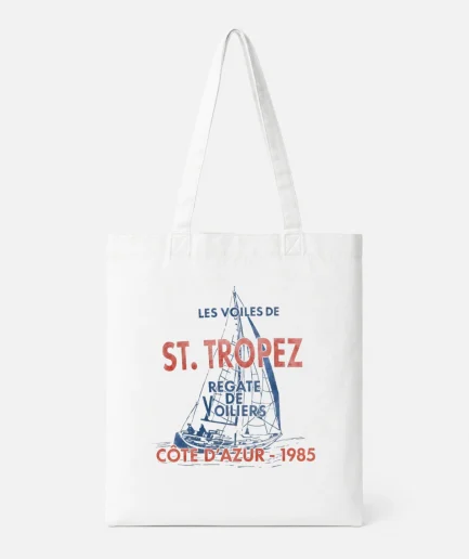tote bag Saint-Tropez vintage blanc sur fond studio minimaliste