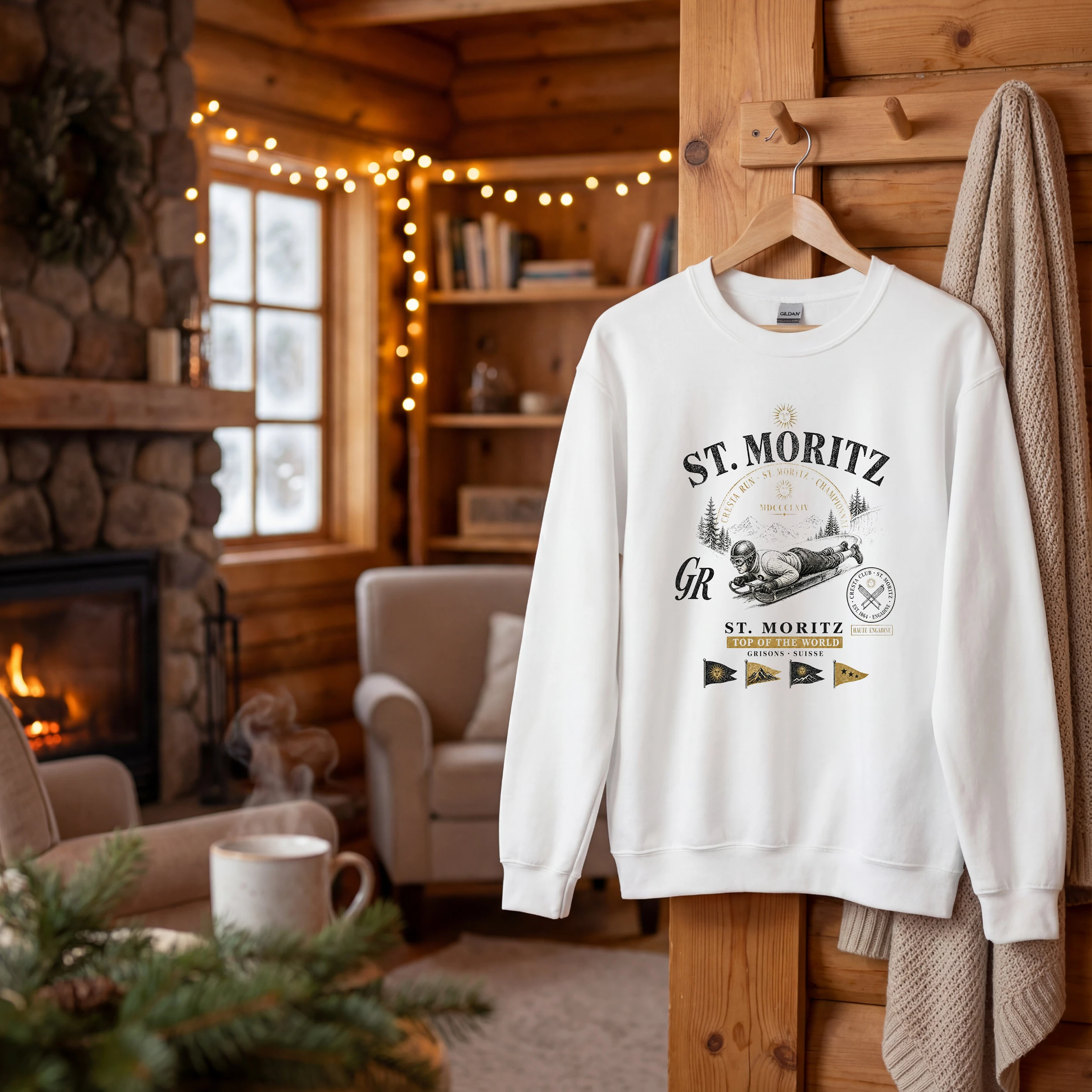 sweat-stmoritz-chalet Sweat St. Moritz vintage blanc suspendu dans un chalet de montagne devant une cheminée
